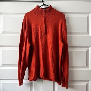Burnt Orange North Face long sleeve with 1/4 zip closure